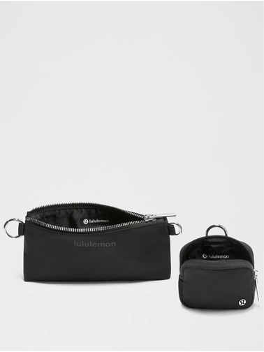 کیف دوتکه Lululemon، مشکی؛ دو کیف کوچک باز با نمایش زیپ و آستر روی زمینه روشن